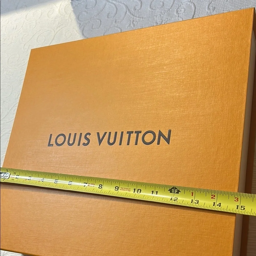 Louis Vuitton Signature  Box inside a LV shipping box with tissue and ribbon.